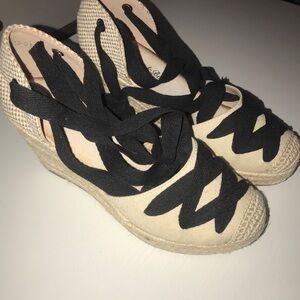 Black and Cream Wedge Shoes with Classic Design